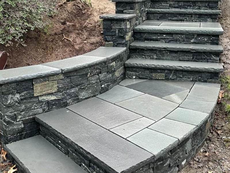 Curved bluestone steps with stone risers